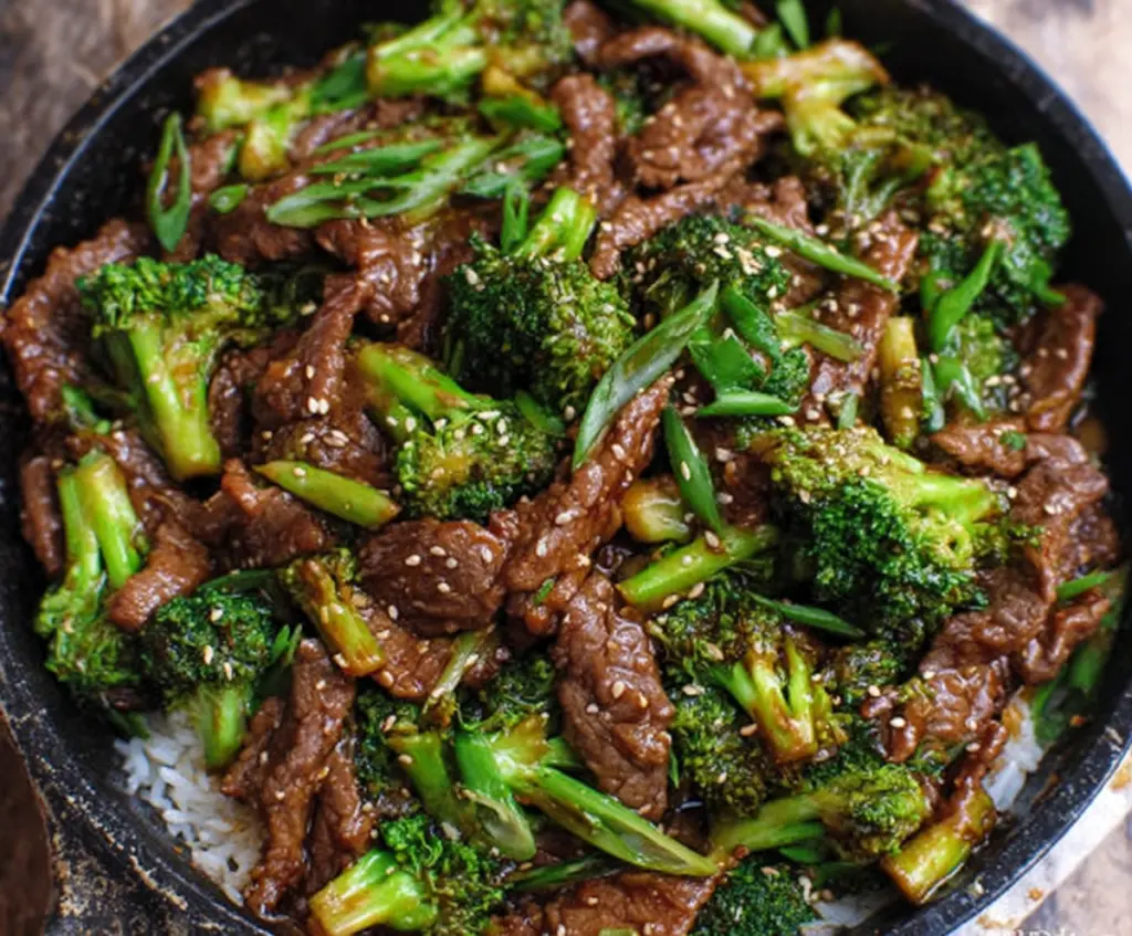 Delicious beef and broccoli stir fry with tender beef slices and fresh broccoli florets in a savory sauce.